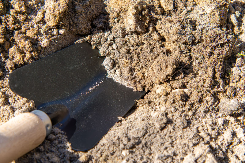 Sandboden mit Schäufelchen